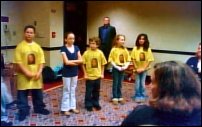 Photograph: The Assumption School Tweenangels Chapter explain The Megan Pledge to attendees at the 2008 WiredKids Summit